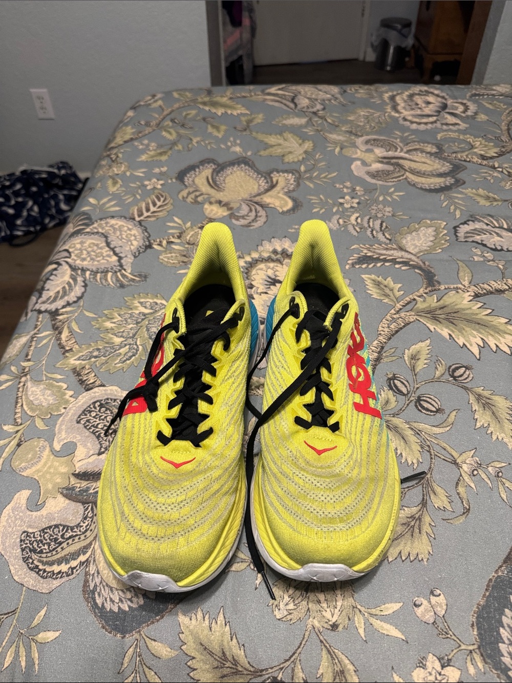 Hoka pro fly  Neon Yellow and blue and red lettering sneakers